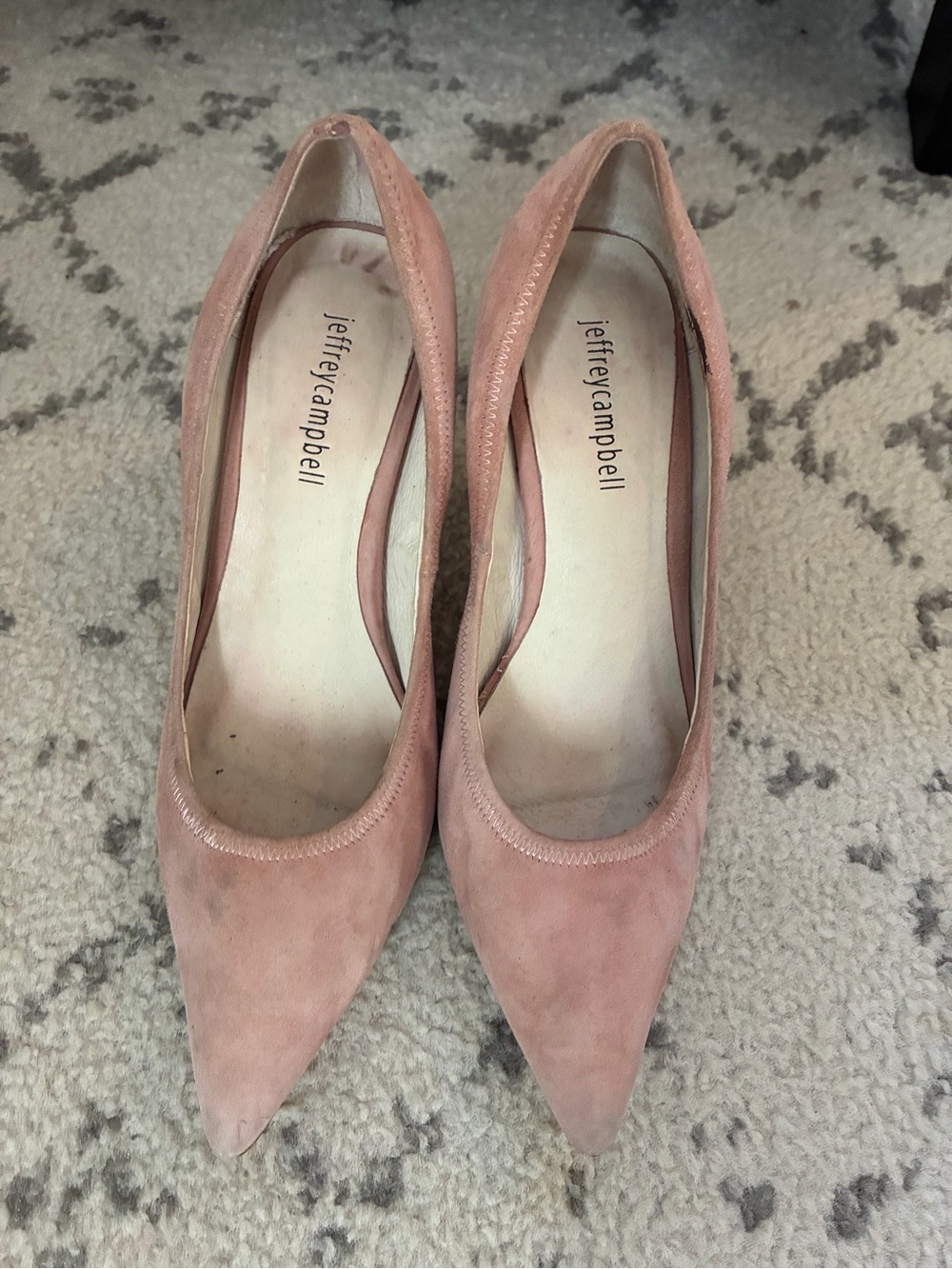 Pink suede pumps